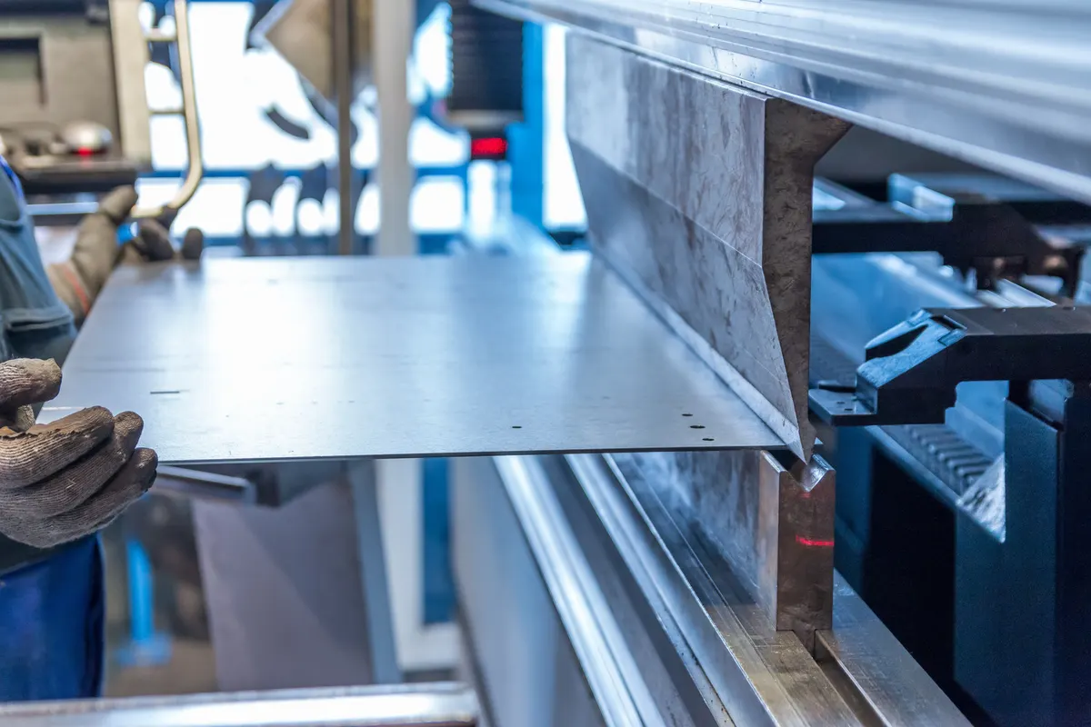 Sheet metal bending process using controlled press brake forming