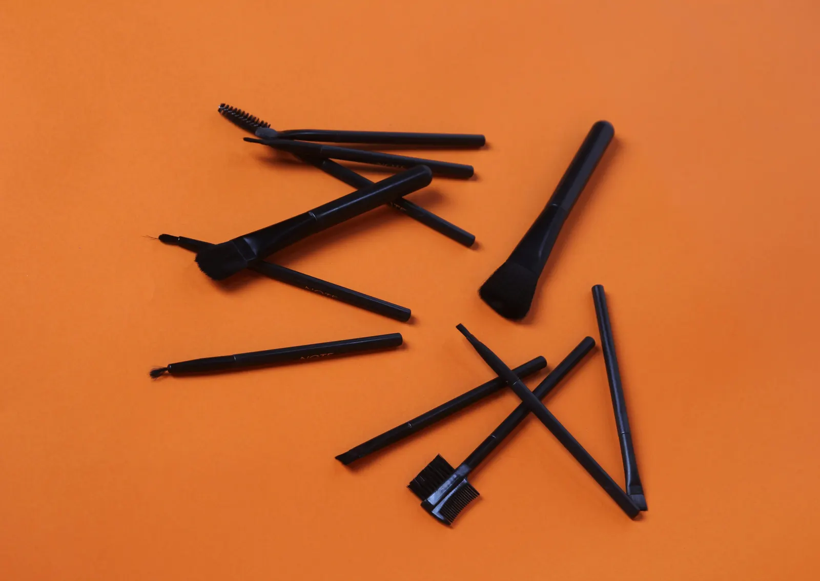 Composite plastic molded parts reinforced for structural performance