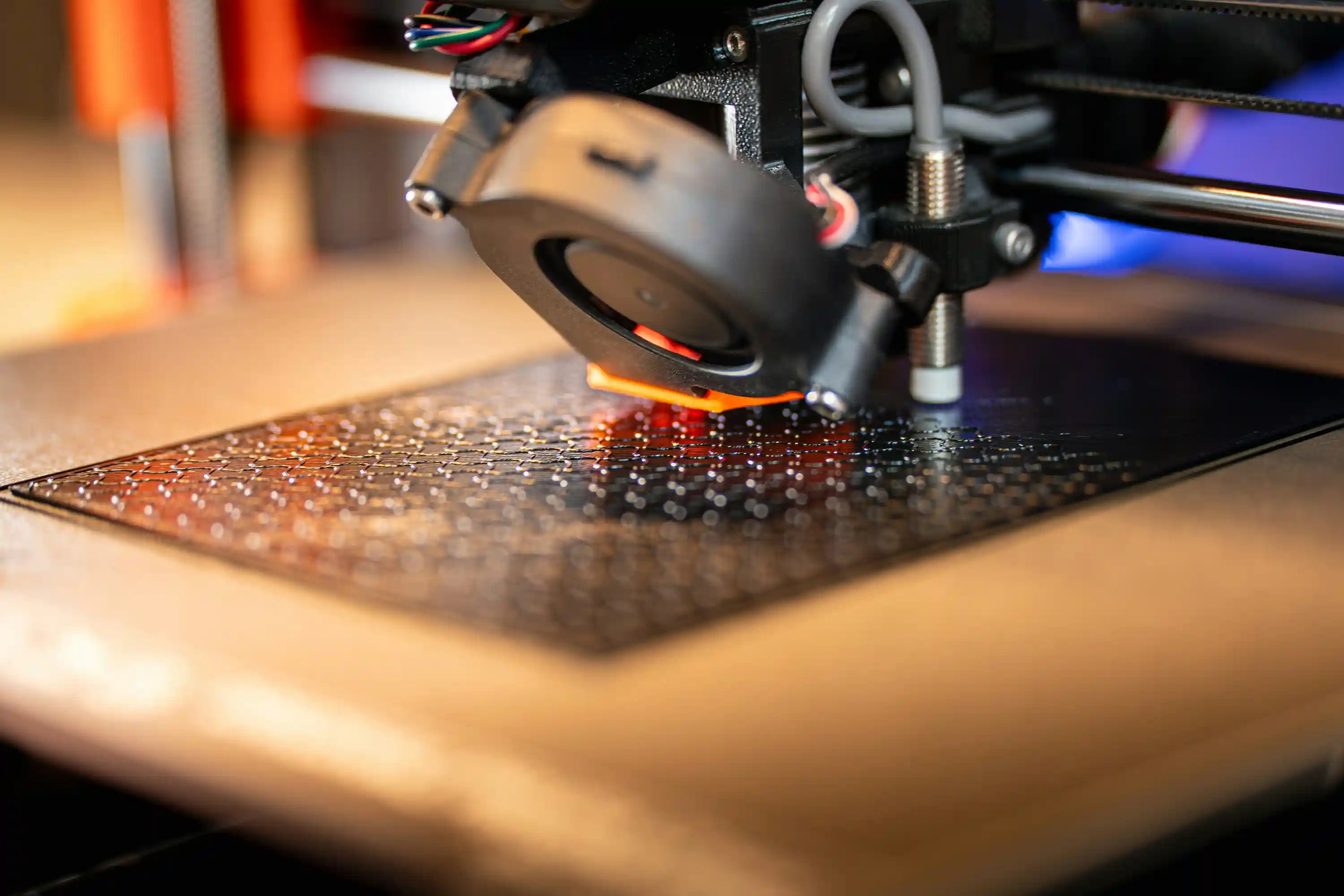 Close-up of an FDM 3D printer building a prototype layer by layer